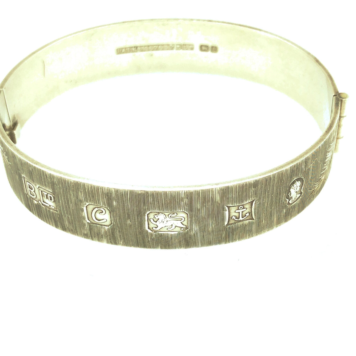 1970s Vintage Silver Hinged Bracelet with Leaf Engraved Pattern The Vintage Jewellery Company