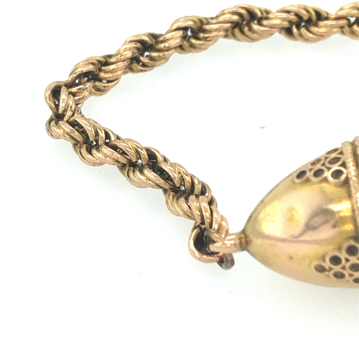 Antique rope twist chain bracelet with lozenge-shaped hollow bead The Vintage Jewellery Company