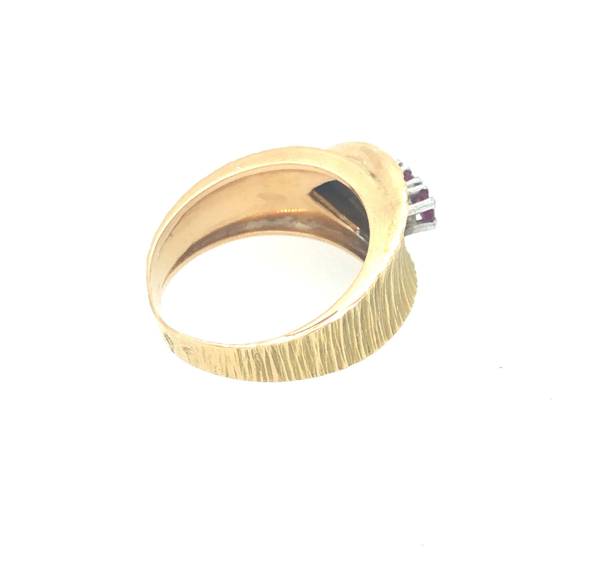 Vintage gold wrapover belt ring with engraved detail and set with three rubies The Vintage Jewellery Company