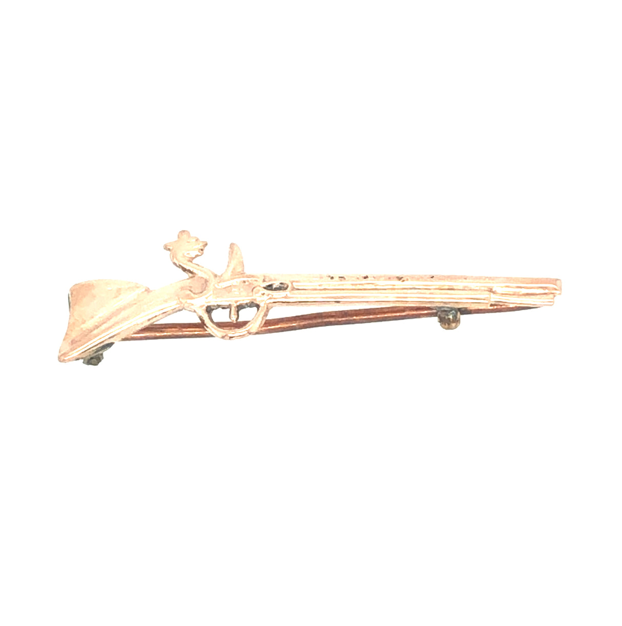 shot gun brooch gold