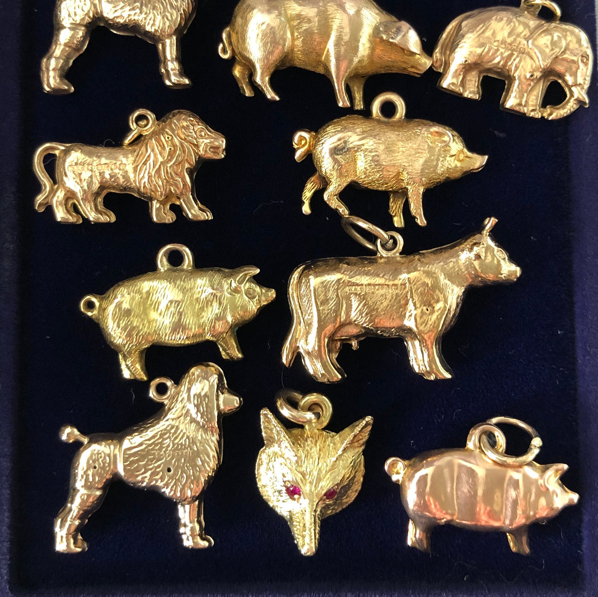vintage gold charms cow, pig, fox , lion, elephant 